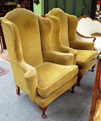 Lot 483 - Pair of late 19th/early 20th century wing back chairs