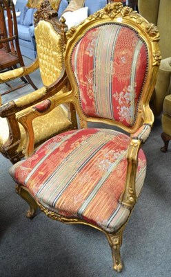 Lot 485 - A French style giltwood armchair with carved supports and arms