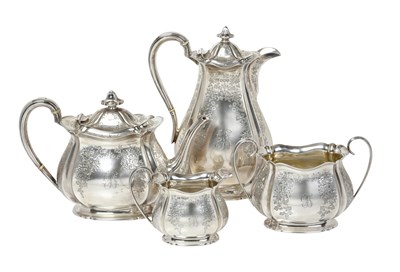 Lot A Four-Piece Victorian, Edward VII and George V Silver Tea-Service