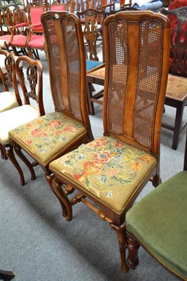 Lot 490 - Pair of 18th century style walnut side chairs with caned back and petit point seat covers