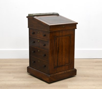 Lot 601 - A Regency Rosewood Davenport, early 19th...