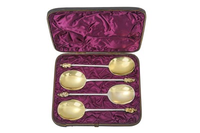 Lot A Cased Set of Four Victorian Parcel-Gilt Silver Apostle-Spoons