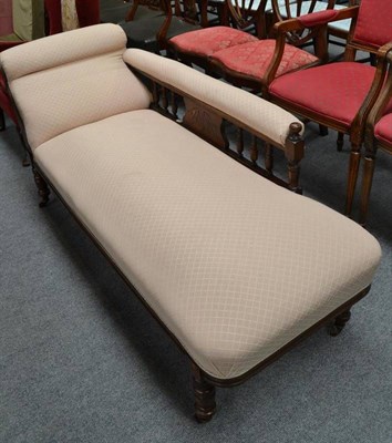 Lot 501 - A 19th century cream upholstered chaise longue