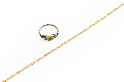 Lot 295 - A Green Stone and Diamond Ring, finger size M...