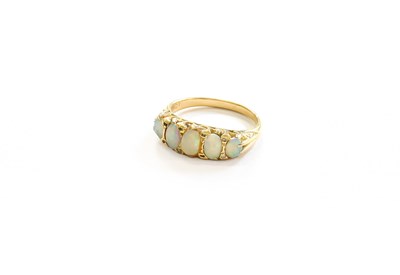 Lot 382 - An Opal and Diamond Ring, five graduated oval...