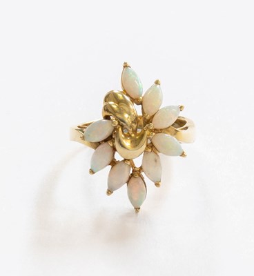 Lot 389 - An Opal Spray Ring, set throughout with...