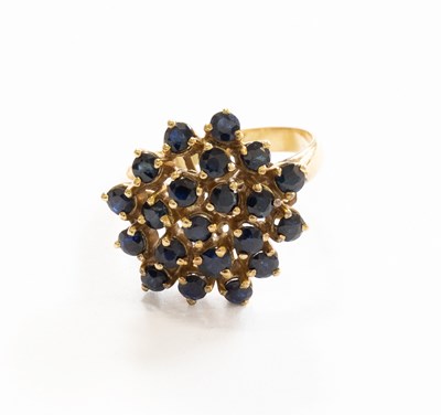 Lot 375 - A Sapphire Cluster Ring, the cluster set...