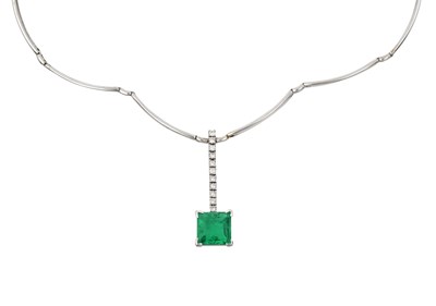 Lot 2303 - A Green Stone and Diamond Necklace a row of...