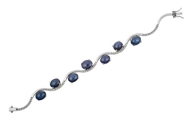 Lot 2285 - A Star Sapphire and Diamond Bracelet plain...