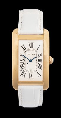 Lot 2153 - Cartier: An 18 Carat Gold Automatic Calendar...