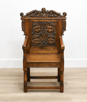 Lot 510 - A 17th Century-Style Carved Oak Wainscot Chair...