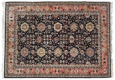 Lot 434 - Indian Carpet, Modern The deep-indigo field...