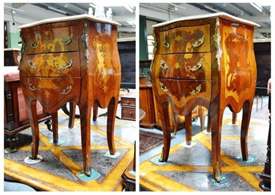 Lot 541 - A pair of small French inlaid side tables with three drawers and marble top