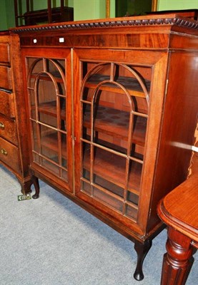 Lot 543 - A Victorian mahogany glazed two door bookcase top on later stand