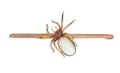 Lot 2434 - An Opal and Ruby Novelty Brooch the yellow...