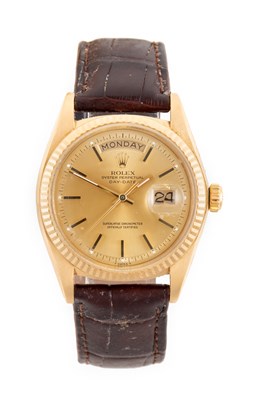 Lot 2145 - Rolex: An 18 Carat Gold Automatic Day/Date...