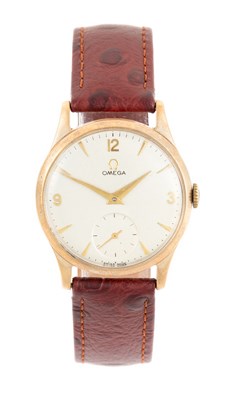Lot 2446 - Omega: A 9 Carat Gold Wristwatch, signed Omega,...