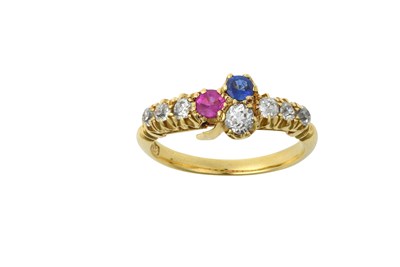 Lot 2407 - A Sapphire, Ruby and Diamond Ring the central...