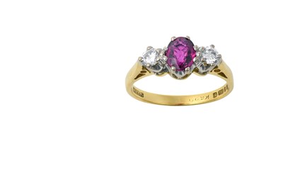 Lot 2240 - An 18 Carat Gold Ruby and Diamond Three Stone...