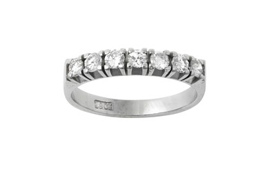 Lot 2308 - A Diamond Half Hoop Ring seven round brilliant...