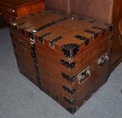 Lot 568 - A late 19th century oak and metal bound hinged trunk, with brass plaque E Martin Smith Esq.,...