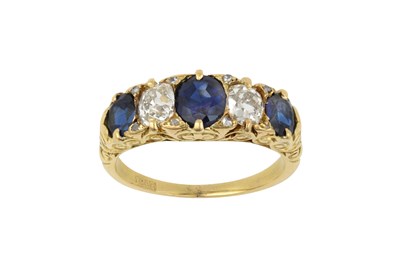 Lot 2020 - A Sapphire and Diamond Five Stone Ring three...