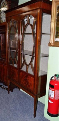 Lot 573 - An Edwardian inlaid glazed china cabinet