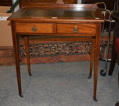Lot 1353 - An Edwardian Leather Inset Writing Table,...