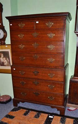 Lot 577 - A Georgian oak chest on chest