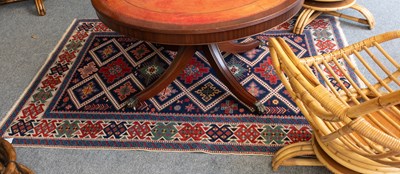 Lot 1103 - Anatolian Rug of Caucasian Design, the indigo...