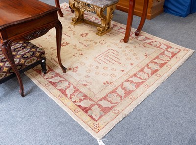 Lot 1106 - Afghan Carpet, the pale wheat field of...