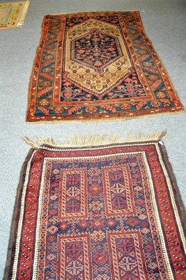 Lot 579 - Hamadan rug, Persian Kurdistan, the camel field with stepped medallions framed by rosette and...