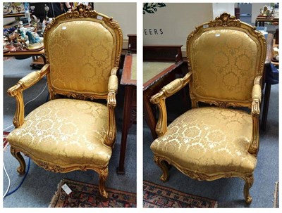 Lot 580 - A pair of  French style gilt framed open armchairs