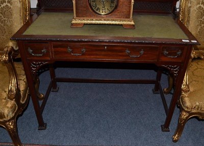 Lot 581 - A 19th century mahogany writing desk with three drawers