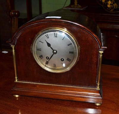 Lot 582 - A mahogany striking mantel clock