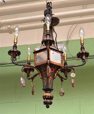 Lot 583 - Two Florentine style toleware mirrored chandeliers and two similar wall lights