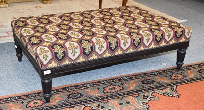 Lot 1224 - An Ebonised Oversized Footstool, with kilim...