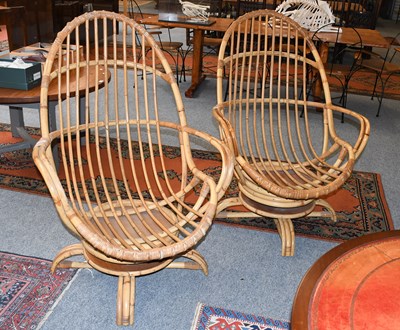 Lot 1252 - A Pair of Swivelling Bamboo Consevatory Chairs...