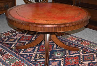 Lot 1255 - A Reproduction Leather Inset Drum Style Coffee...