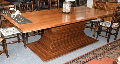 Lot 1266 - A Modern Oak Dining Table, on a stepped...