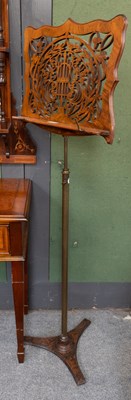 Lot 1301 - A Victorian Carved and Pierced Walnut Music...