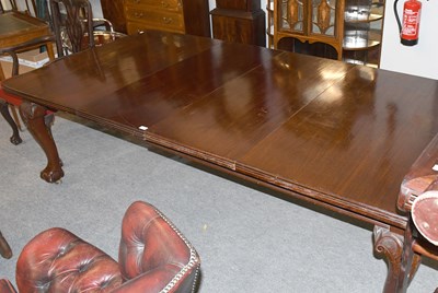 Lot 1354 - A 19th Century Wind Out Mahogany Dining Table,...