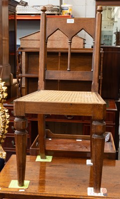 Lot 1334 - An Early 20th Century Oak Hall Chair, the cane...