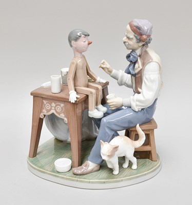 Lot 329 - Lladro Porcelain Figure of Geppetto and...