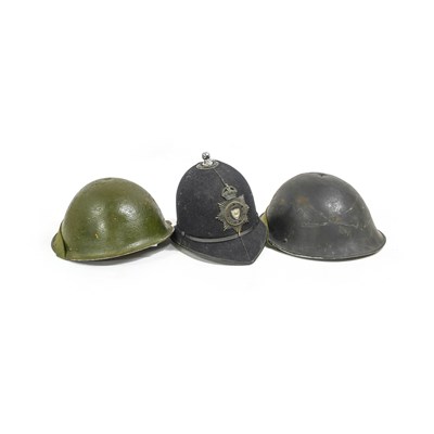 Lot 234 - Two British Mk.IV Turtle Combat Helmets, one...