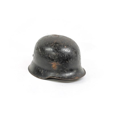 Lot 236 - A German M34 Police Helmet, the black painted...