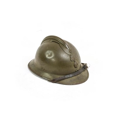 Lot 240 - A French M1926 Adrian Helmet, with green paint...
