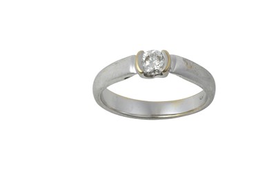 Lot 2319 - A Diamond Solitaire Ring the round brilliant...