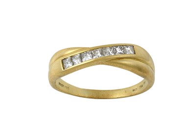 Lot 2324 - An 18 Carat Gold Diamond Crossover Ring seven...