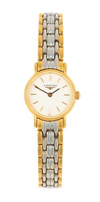 Lot 2478 - Longines: A Lady's Bi-Metal Wristwatch, signed...